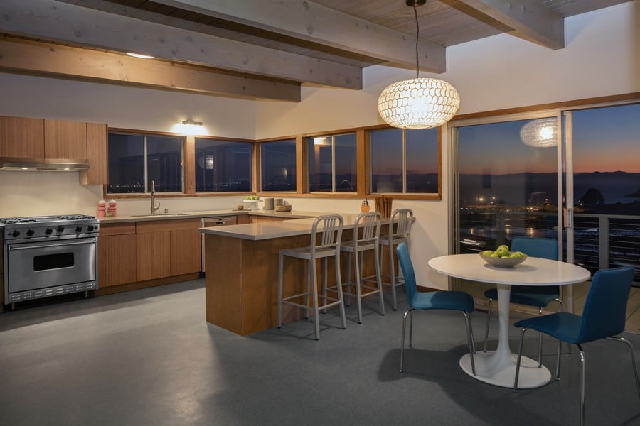 amazing kitchen at night with mountain view.